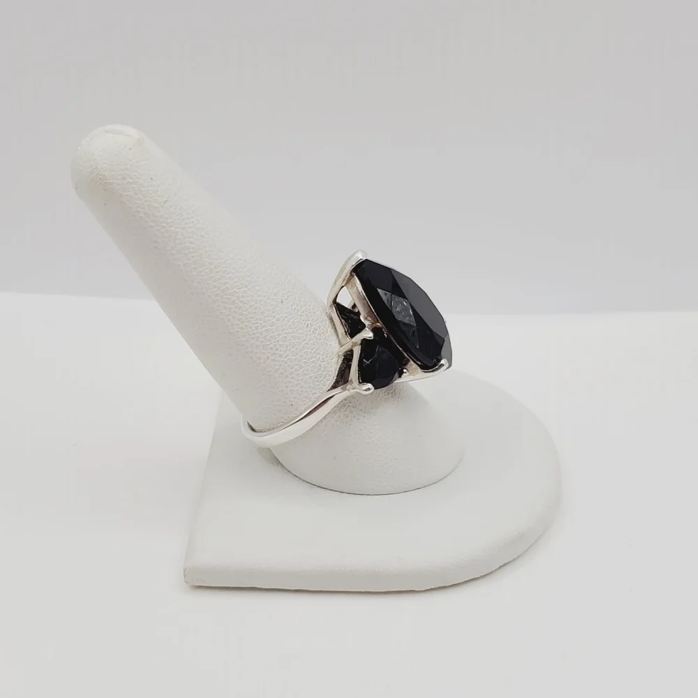 22 Carat Pear & Trillion Thai Black Spinel Platinum | 925 Sterling Silver Ring